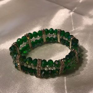 Green and clear bead; stretchy with silver spacer